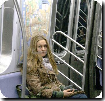 Alicia Silverstone
listening to her iPod while riding the subway in Manhattan.