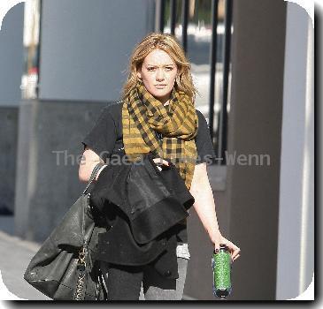 Hilary Duff carrying a reusable coffee mug after visiting an office building in HollywoodLos Angeles.