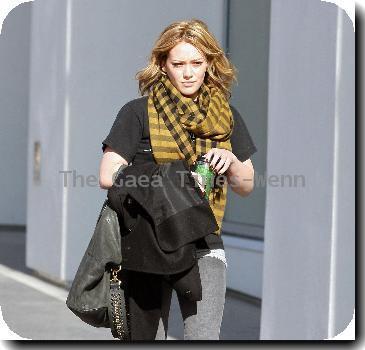 Hilary Duff carrying a reusable coffee mug after visiting an office building in HollywoodLos Angeles.