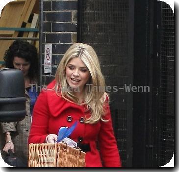 Holly Willough by
leaving the ITV studios.