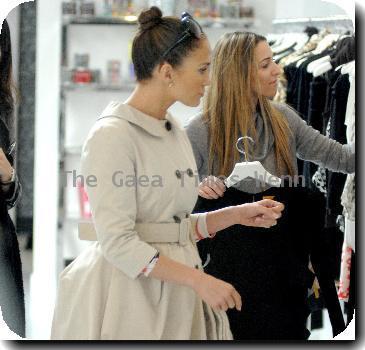 Jennifer Lopez shops at the Alice + Olivia store on Robertson Boulevard. The singer wore a cropped coat and held a matching beige handbag.