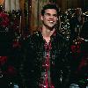 Taylor Lautner during his opening monologue.Taylor mention his  failure to stand up for Taylor Swift at the MTV Video Music Awards when Kanye West interrupted her acceptance speech. Showing a clip of him standing idly by, he said,