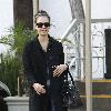 Jessica Alba in square toed shoes and a large over coat at a meeting in Beverly Hills.