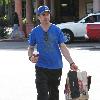 Robert Downey Jr. 
goes shopping at Cross Creek in Malibu, carrying a coffee..