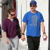 Robert Downey Jr. 
goes shopping at Cross Creek in Malibu, carrying a coffee..