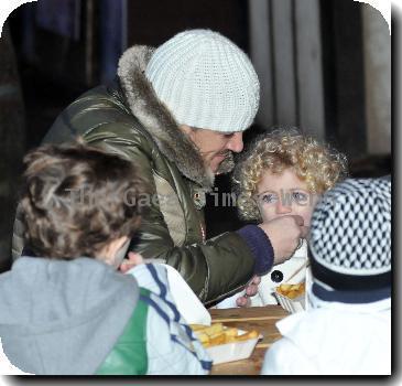 Peter Andre carrying Junior and Princess Tiaamii  
at 'Winter Wonderland' in Hyde Park.