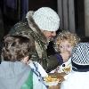 Peter Andre carrying Junior and Princess Tiaamii  
at 'Winter Wonderland' in Hyde Park.