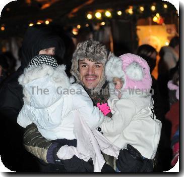 Peter Andre carrying Junior and Princess Tiaamii  
at 'Winter Wonderland' in Hyde Park.