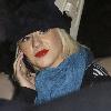 Christina Aguilera got into a scrape with paparazzi during a drive through Hollywood - her car was surrounded by snappers after her driver smashed the front of her luxury vehicle.The superstar was being driven home through Beverly Hills, California when her hapless chauffeur scrapped the front bumper of her white Range Rover.The pursuing paps quickly made the most of the photo opportunity, as the Dirty singer's burly security guards helped the star out of her blemished motor and into another car.But Aguilera seemed to be in cheery Christmas spirit - laughing and smiling while she waited for her rescue party. Los Angeles.