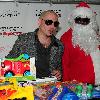 Rapper, PitBull real name Armando Christian P'rez (centre) at the City Miami Parks and Recreation and Community Organizations Annual Toy Give-A-Way at Charles Hadley Park.