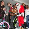 Rapper, PitBull real name Armando Christian P'rez (centre) at the City Miami Parks and Recreation and Community Organizations Annual Toy Give-A-Way at Charles Hadley Park.