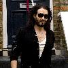 Russell Brand 
leaving his home on Christmas Eve..