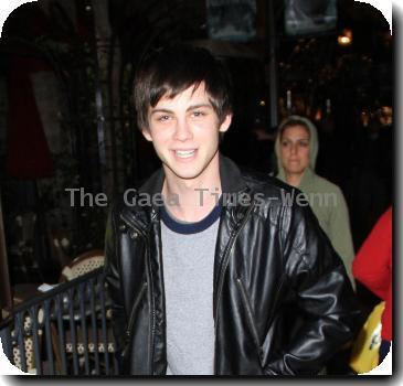 Logan Lerman going to a movie theater with a friend in Hollywood.Los Angeles.