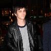 Logan Lerman going to a movie theater with a friend in Hollywood.Los Angeles. Logan Lerman going to a movie theater with a friend in Hollywood.Los Angeles.