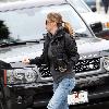 Ellen Pompeo returns to her car after buyintog tickets for the new movie Avatar.Los Angeles.