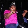 Gabourey Sidibe helps light up the 2010 New Year's Eve numerals by pedaling for power at the Duracell Smart Power Lab in Times SquareNew York City.