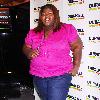 Gabourey Sidibe helps light up the 2010 New Year's Eve numerals by pedaling for power at the Duracell Smart Power Lab in Times SquareNew York City.