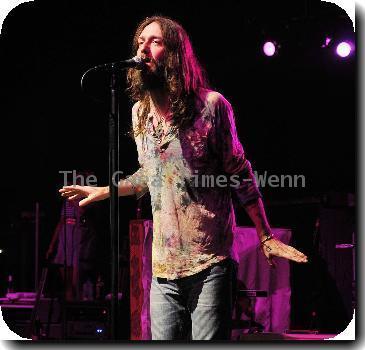 ROBINSON WELCOMES DAUGHTER BLACK CROWES rocker CHRIS ROBINSON is celebrating after the birth of a baby daughter on Saturday (26Dec09).
The frontman and his wife Allison Bridges, who he married earlier this year (09), welcomed their first child together the day after Christmas (25Dec09) at their Los Angeles home.
The musician and his wife named the newborn Cheyenne Genevieve.
A spokesperson for Robinson tells People.com,