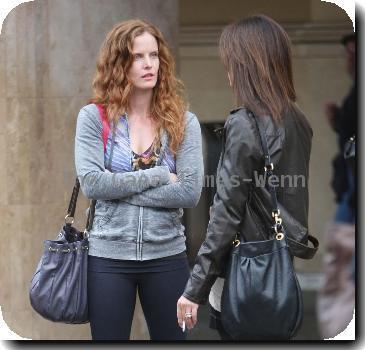 English actress Rebecca Mader stops to chat to a friend while out shopping with her daughter in Hollywood..