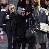 Pete Wentz and Ashlee Simpson 
hold hands as they walk through Soho together..