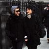 Pete Wentz and Ashlee Simpson 
hold hands as they walk through Soho together..