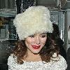 Anna Friel leaves the Royal Haymarket Theatre in a white fur hat and wearing a white crochet dress, during a snowy night after her evening performance of 'Breakfast at Tiffany's' London.