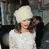 Anna Friel leaves the Royal Haymarket Theatre in a white fur hat and wearing a white crochet dress, during a snowy night after her evening performance of 'Breakfast at Tiffany's' London.