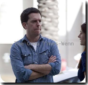 Ed Helms stops in the street to talk to a friend in downtown Beverly HillsLos Angeles.