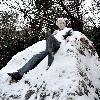 Atmosphere
 statue of the legendary Irish playwright, poet and author Oscar Wilde is covered in snow in Merrion Square park.