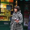 Natalie Cassidy buys two bottles of a soft drink from her local shop before returning homeLondon.