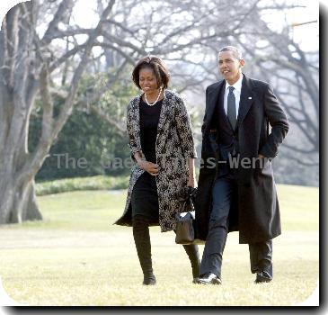 First Lady Michelle Obama and President Barack Obama 
return to the White House from Delaware after attending the funeral for Joe Biden's mother, Jean, who died Friday (08Jan10) at age 92..