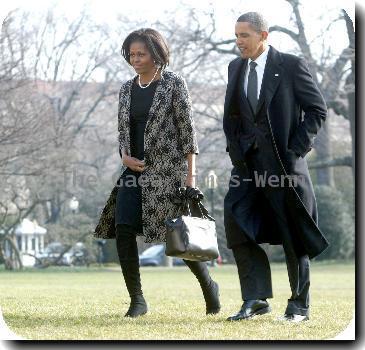 First Lady Michelle Obama and President Barack Obama 
return to the White House from Delaware after attending the funeral for Joe Biden's mother, Jean, who died Friday (08Jan10) at age 92..