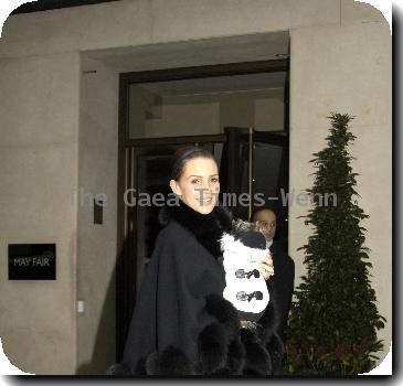 Danielle Lloyd 
arrives at the May Fair Hotel, carrying her little dog..