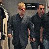 Sir Elton John and husband David Furnish shopping at Dolce & Gabbana in Beverly HillsLos Angeles.