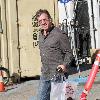 Tim Allen
 leaving Samy's Camera where he purchased a new digital camera.