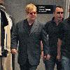 Sir Elton John and husband David Furnish
 shopping at Dolce & Gabbana in Beverly Hills.