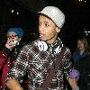 JLS singer Aston Merrygold was mobbed by dozens of female fans as he left the BBC Radio One studios after co-presenting wBBC Switch with Nick Grimshaw.