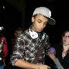 JLS singer Aston Merrygold was mobbed by dozens of female fans as he left the BBC Radio One studios after co-presenting wBBC Switch with Nick Grimshaw.