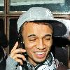 JLS singer Aston Merrygold was mobbed by dozens of female fans as he left the BBC Radio One studios after co-presenting wBBC Switch with Nick Grimshaw.