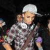 JLS singer Aston Merrygold was mobbed by dozens of female fans as he left the BBC Radio One studios after co-presenting wBBC Switch with Nick Grimshaw.