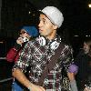 JLS singer Aston Merrygold was mobbed by dozens of female fans as he left the BBC Radio One studios after co-presenting wBBC Switch with Nick Grimshaw.