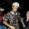 JLS singer Aston Merrygold was mobbed by dozens of female fans as he left the BBC Radio One studios after co-presenting wBBC Switch with Nick Grimshaw.