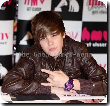 Justin Bieber signs his new album ' My World' at HMV in Westfield.