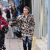 Coleen Rooney shopping with her parents and her baby in Wilmslow Cheshire.