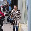 Coleen Rooney shopping with her parents and her baby in Wilmslow Cheshire.