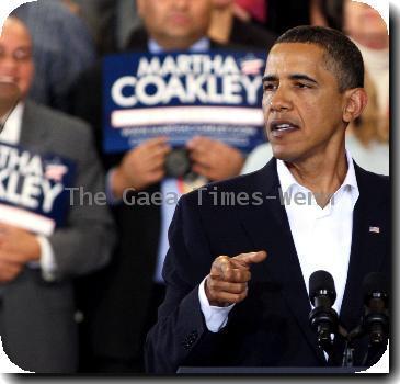 U.S. President Barack Obama joins Martha Coakley, the attorney general of Massachusetts and Democratic candidate for the U.S. Senate, during a campaign rally.