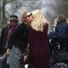 Stella McCartney talks to newly pregnant Claudia Schiffer whilst doing the school run London.