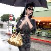 Katy Perry
holds her umbrella while leaving Cravings restaurant in Los Feliz after having lunch with a friend.