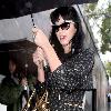 Katy Perry
holds her umbrella while leaving Cravings restaurant in Los Feliz after having lunch with a friend.