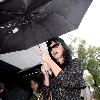 Katy Perry
holds her umbrella while leaving Cravings restaurant in Los Feliz after having lunch with a friend.